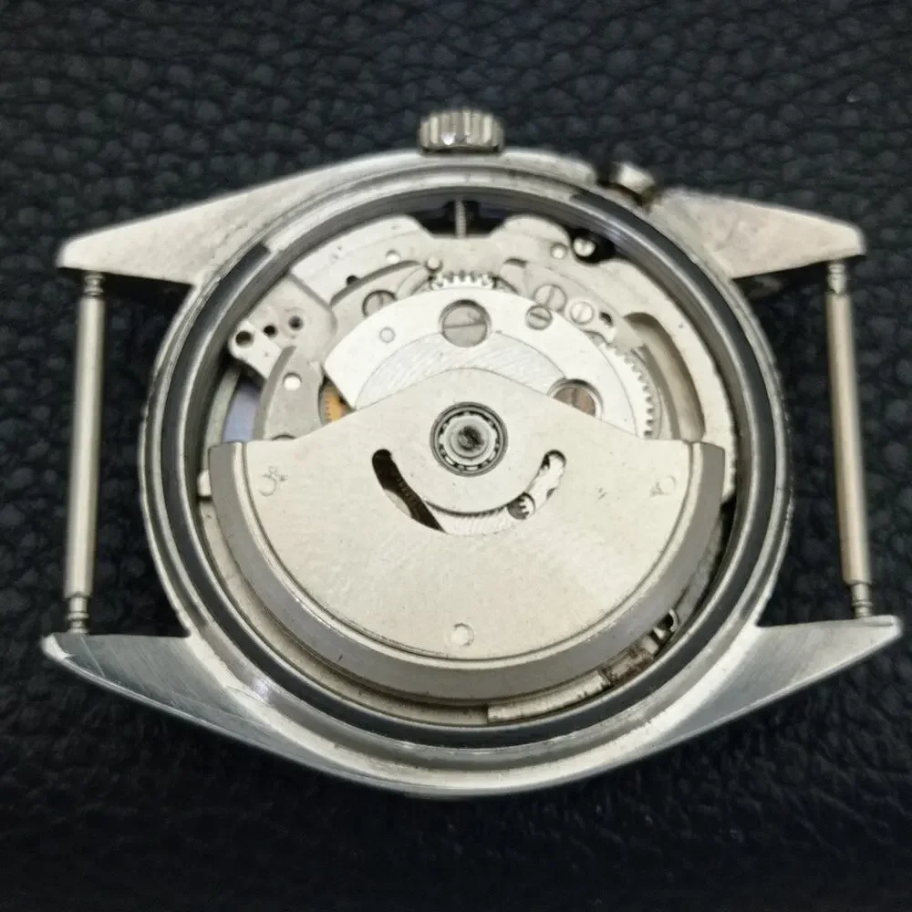 Vintage 1976 Ricoh Automatic Mens Silver Watch W/daydate & Gold accents